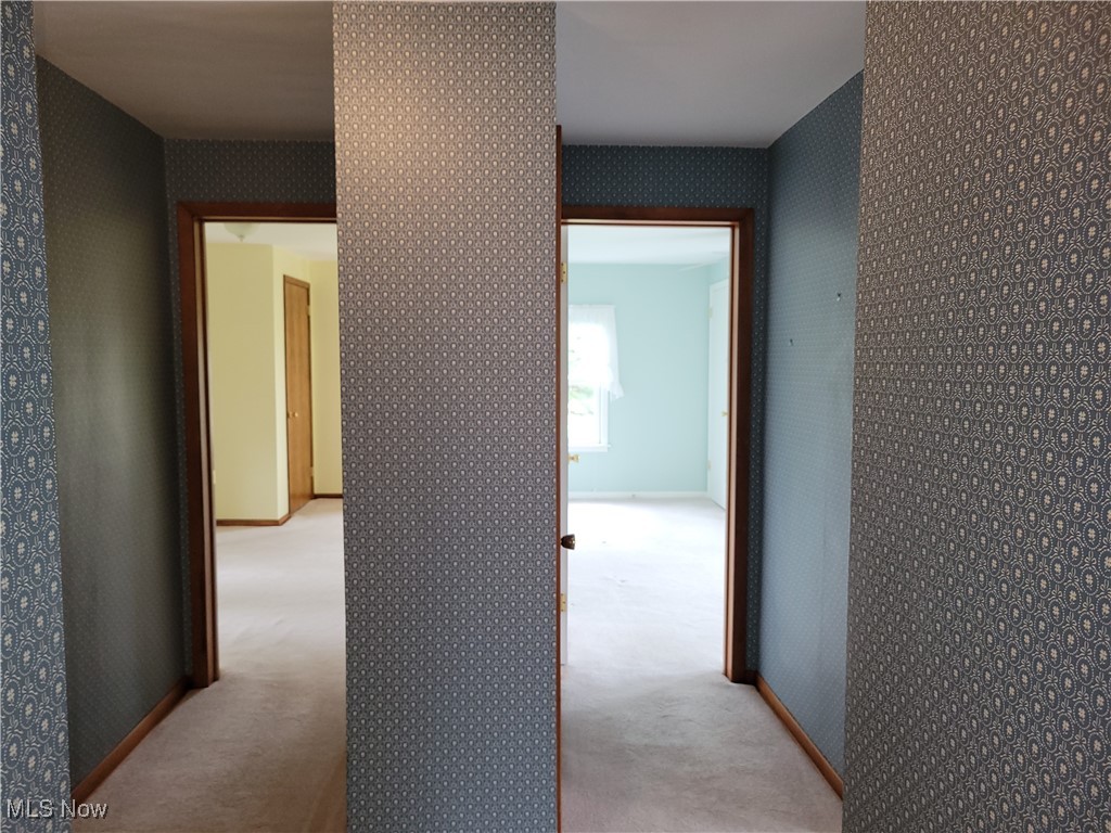 29119 Edgewood Road Bay Village, OH 44140 - Photo 23 of 40 Hallway featuring wallpapered walls and light colored carpet