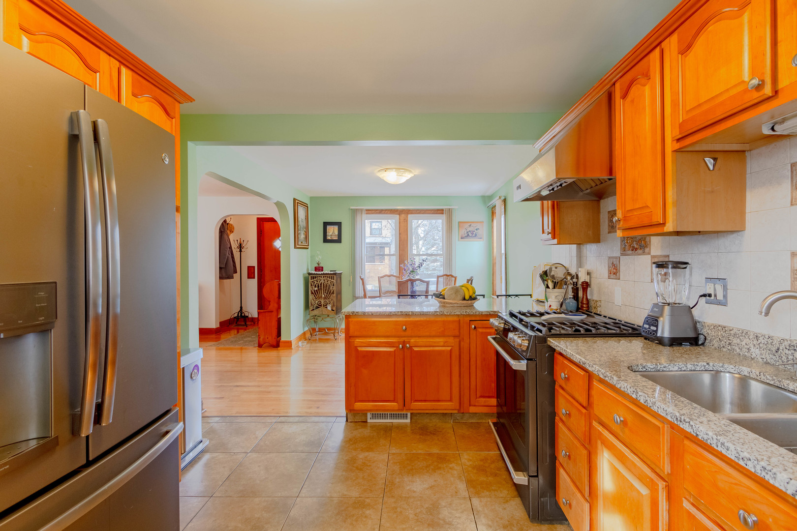 6410 Sinclair Avenue Berwyn, IL 60402 - Photo 13 of 31 a kitchen with stainless steel appliances granite countertop a refrigerator and a sink
