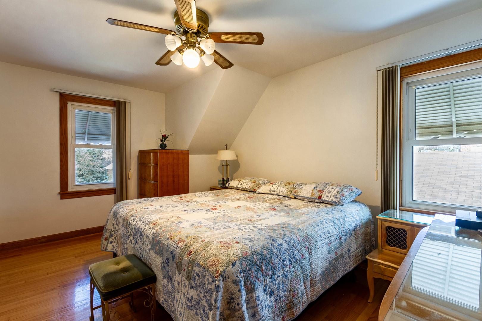 6410 Sinclair Avenue Berwyn, IL 60402 - Photo 18 of 31 a bedroom with a bed and a window