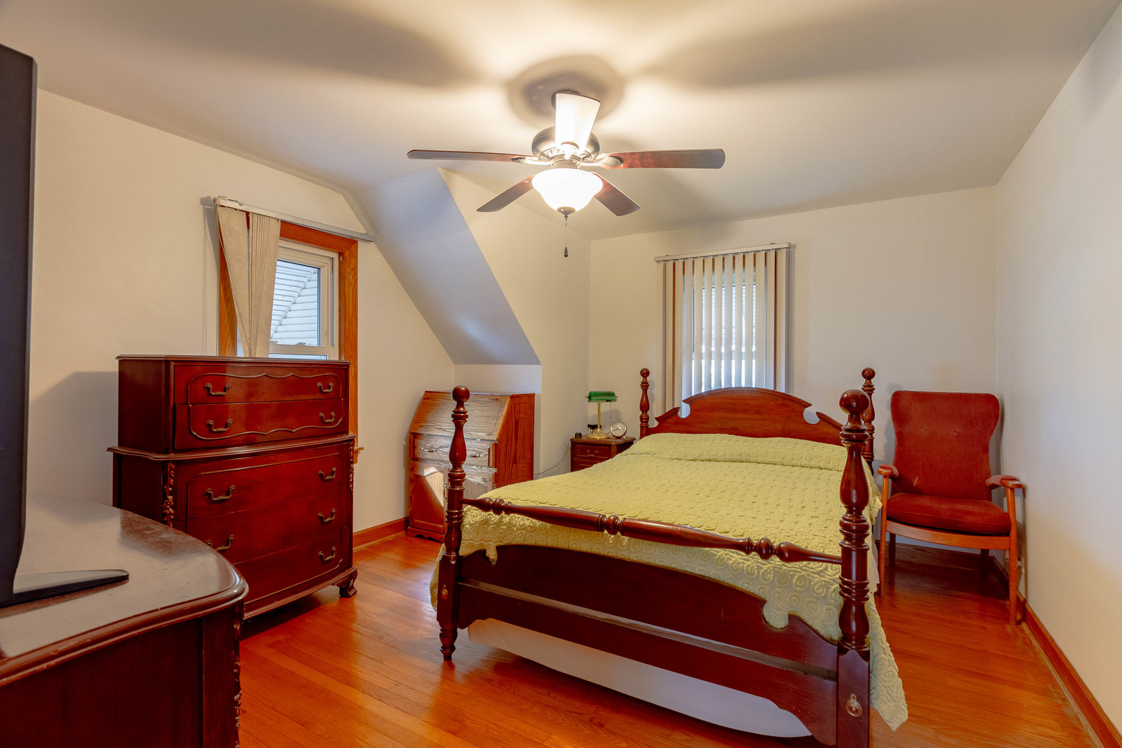 6410 Sinclair Avenue Berwyn, IL 60402 - Photo 21 of 31 a bedroom with a bed and wooden floor