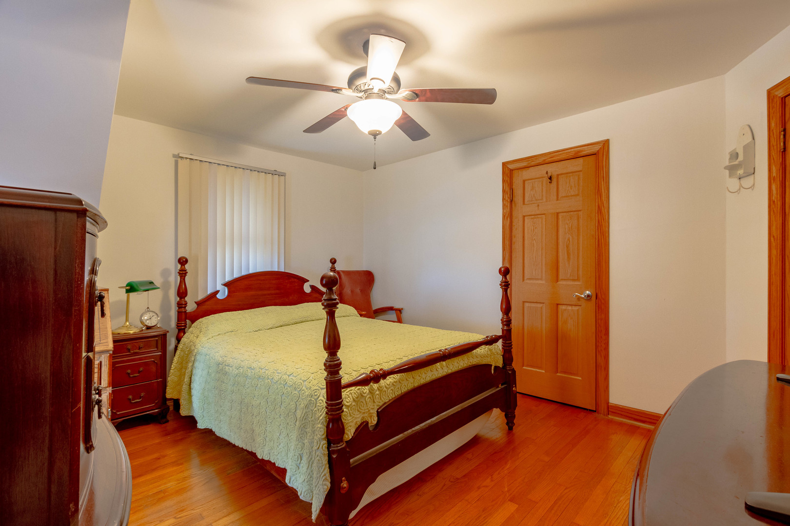 6410 Sinclair Avenue Berwyn, IL 60402 - Photo 22 of 31 a bed room with a bed and a ceiling fan