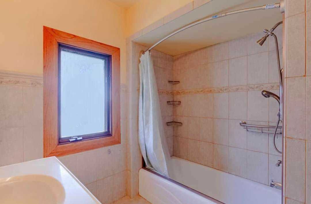 6410 Sinclair Avenue Berwyn, IL 60402 - Photo 24 of 31 a bathroom with a shower and toilet