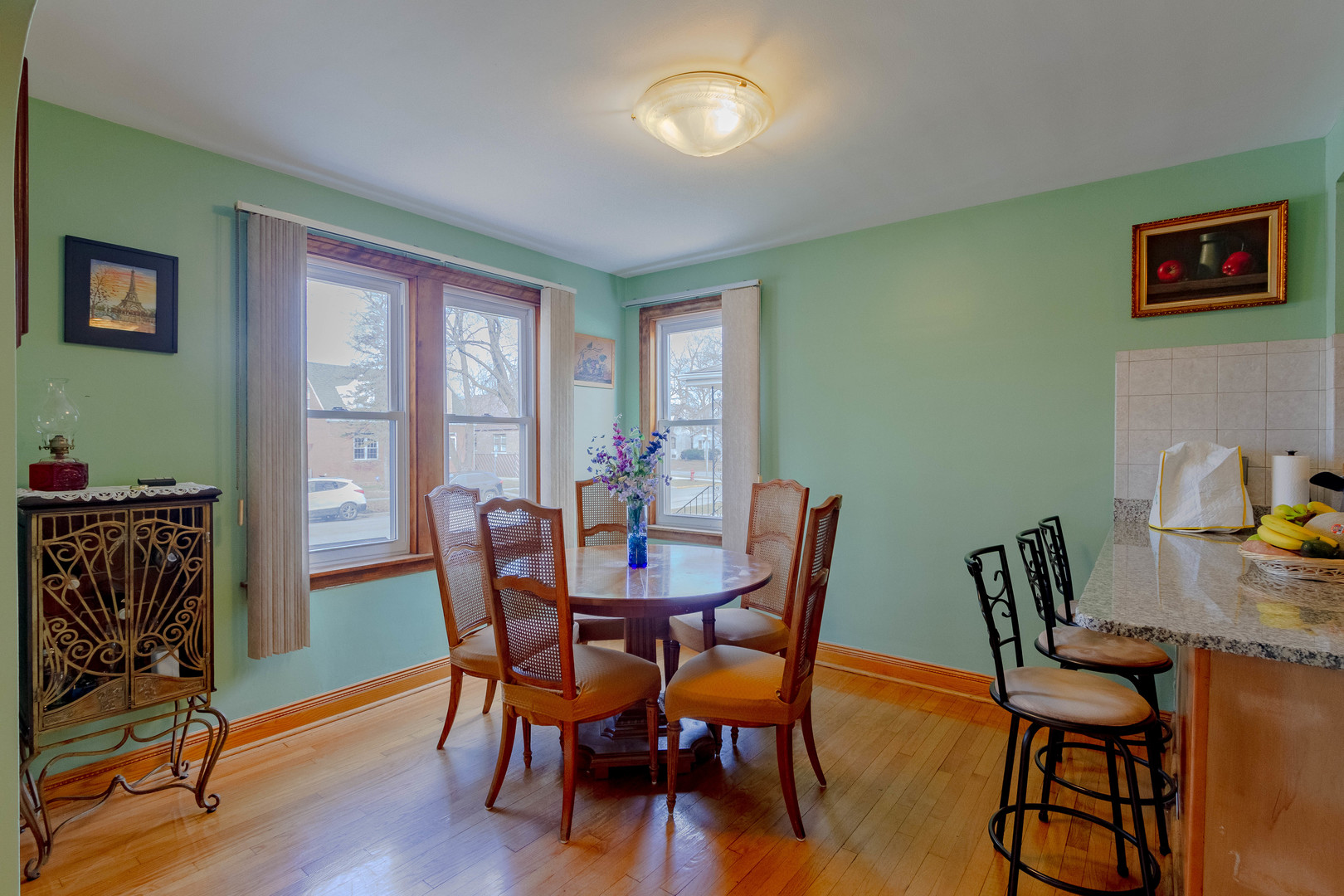 6410 Sinclair Avenue Berwyn, IL 60402 - Photo 10 of 31 a view of a dining room with furniture window and wooden floor