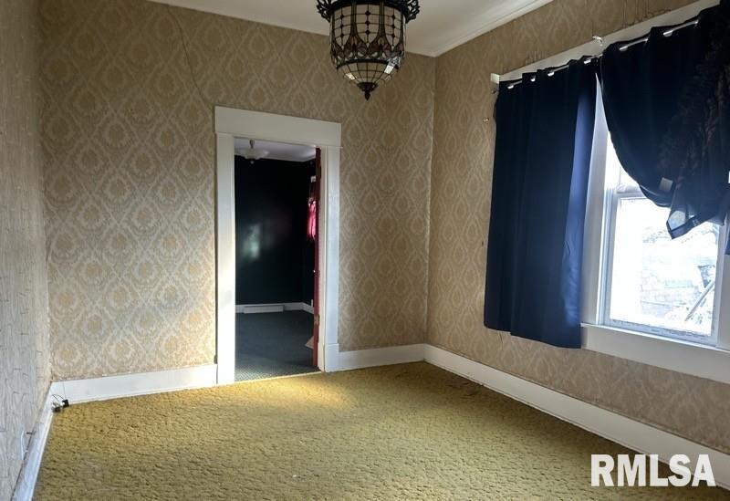 204 North Maple Street Christopher, IL 62822 - Photo 17 of 29 a view of an empty room with a window