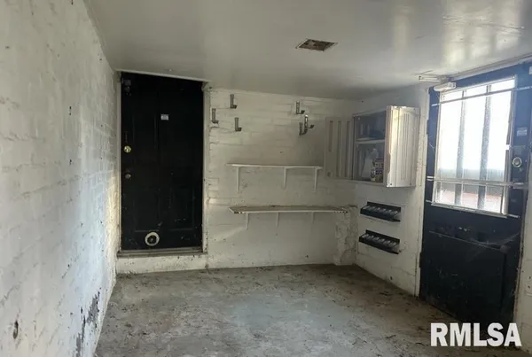 wooden floor and window in an empty room