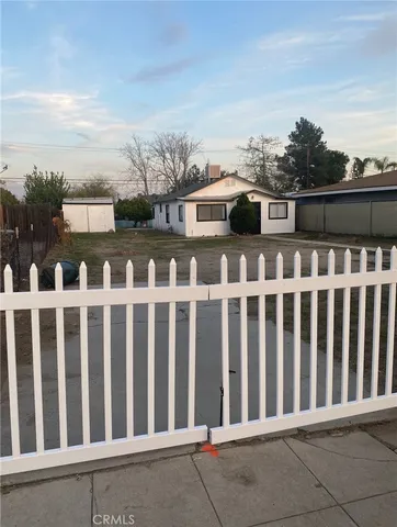 a view of a wooden fence