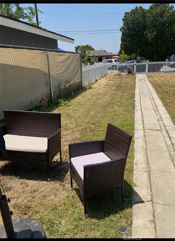 a swimming pool with view of barbeque oven