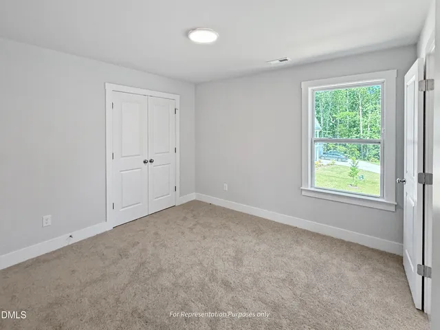 a view of a lake with a city