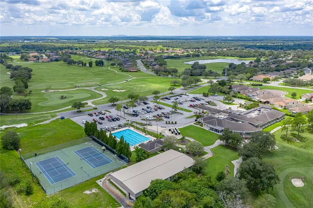 an aerial view of a house with a garden
