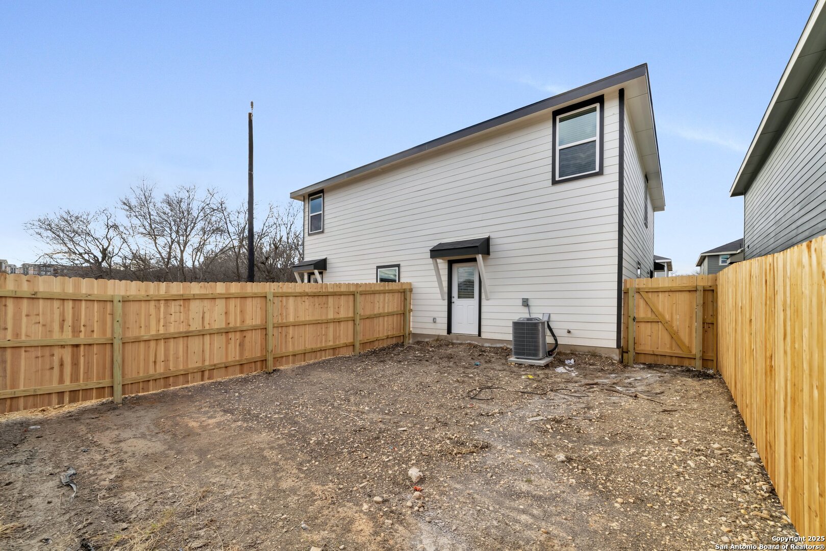 8711 Key Windy Way, Unit 2 Converse, TX 78109 - Photo 22 of 22 a view of a backyard