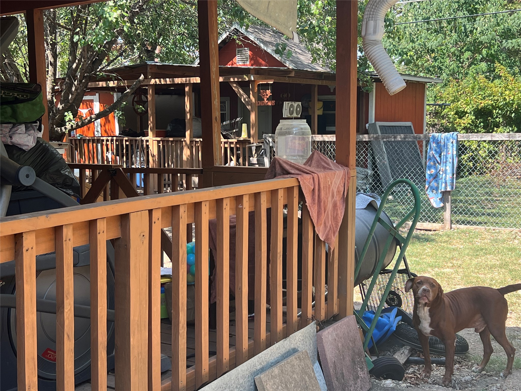 1124 Spur Street Austin, TX 78721 - Photo 2 of 3 a view of a house with backyard and sitting area