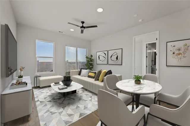 a living room with furniture and a table