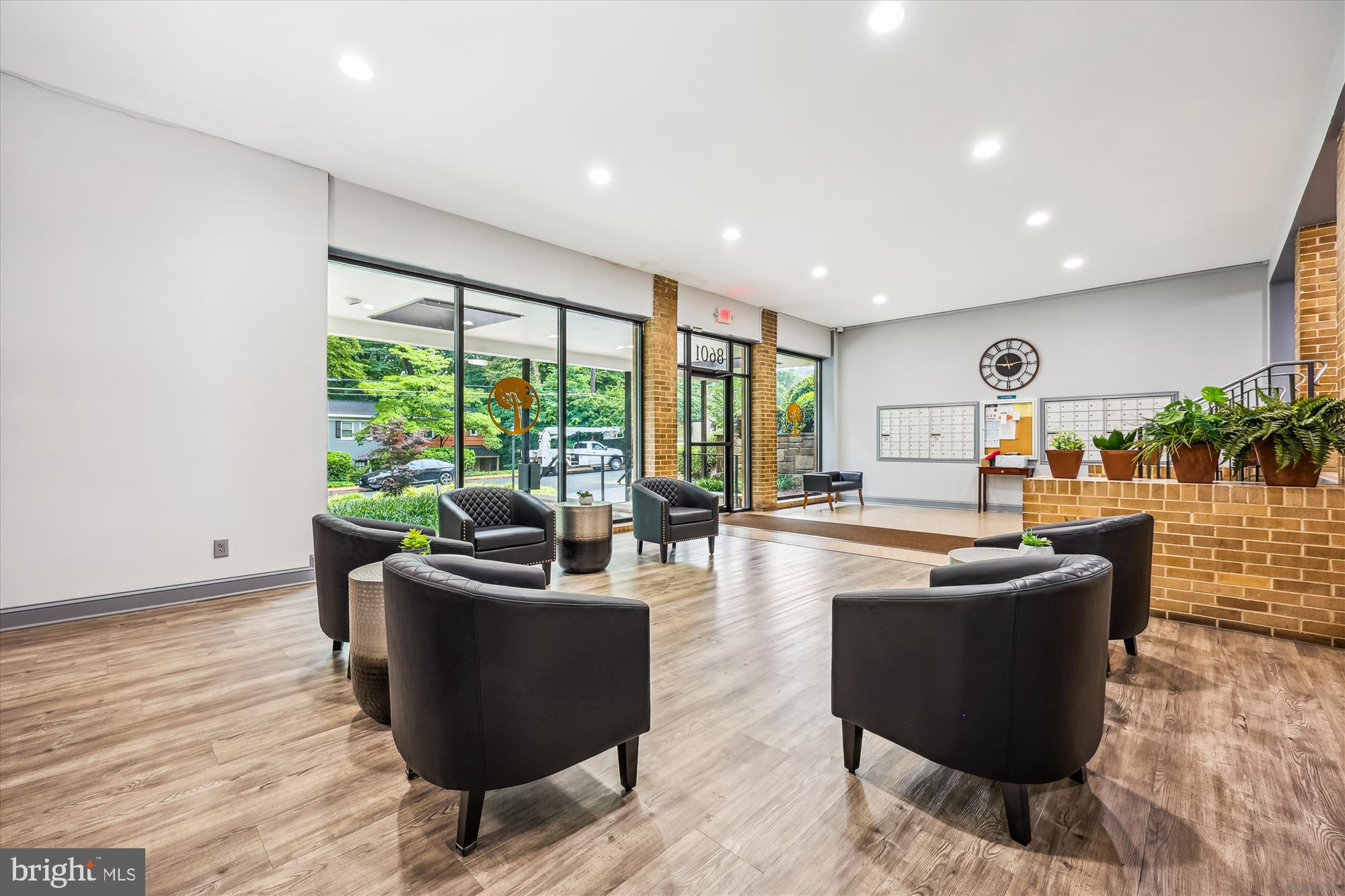 8601 Manchester Road, Unit 319 Silver Spring, MD 20901 - Photo 34 of 70 a living room with furniture and a large window