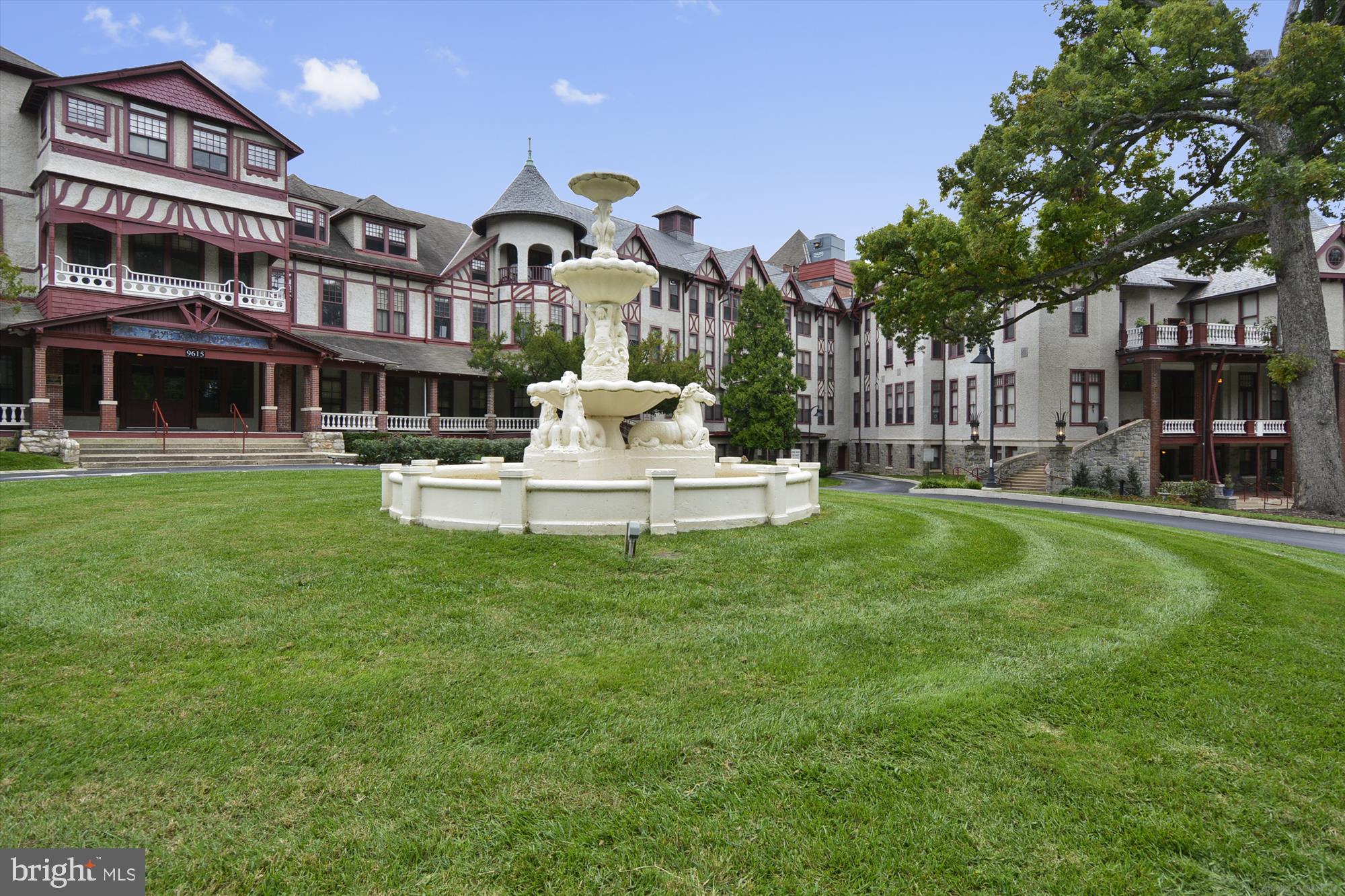 8601 Manchester Road, Unit 319 Silver Spring, MD 20901 - Photo 41 of 70 a front view of a building with a garden
