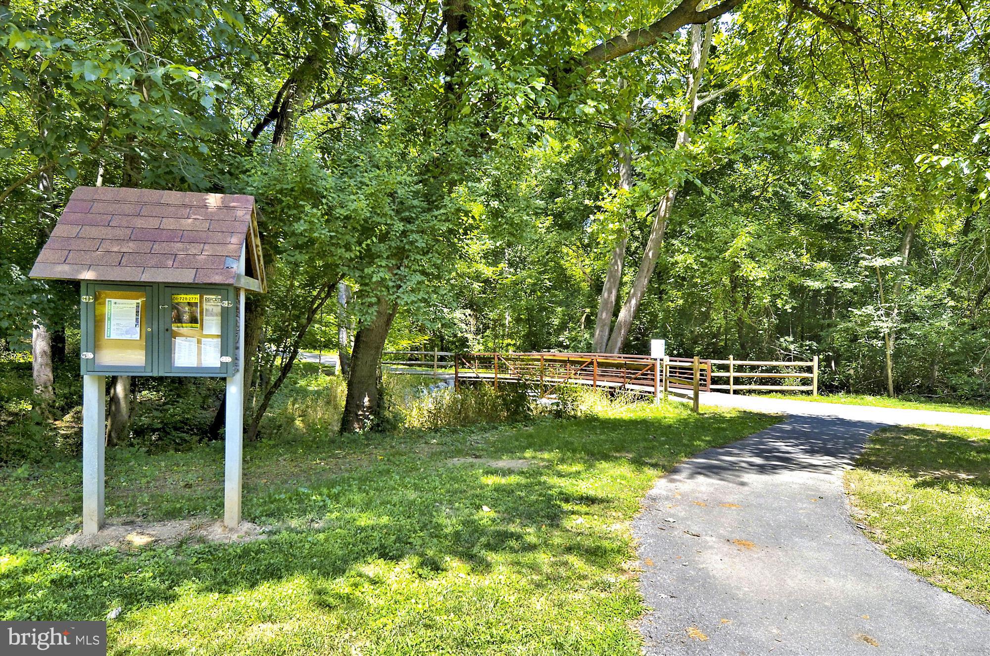 8601 Manchester Road, Unit 319 Silver Spring, MD 20901 - Photo 43 of 70 a view of a house with a yard