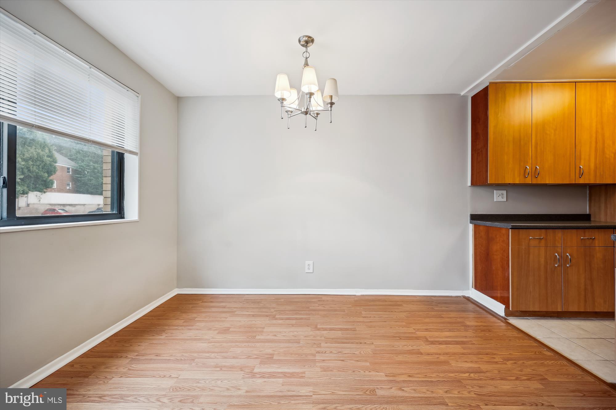 8601 Manchester Road, Unit 319 Silver Spring, MD 20901 - Photo 7 of 70 a view of empty room with wooden floor