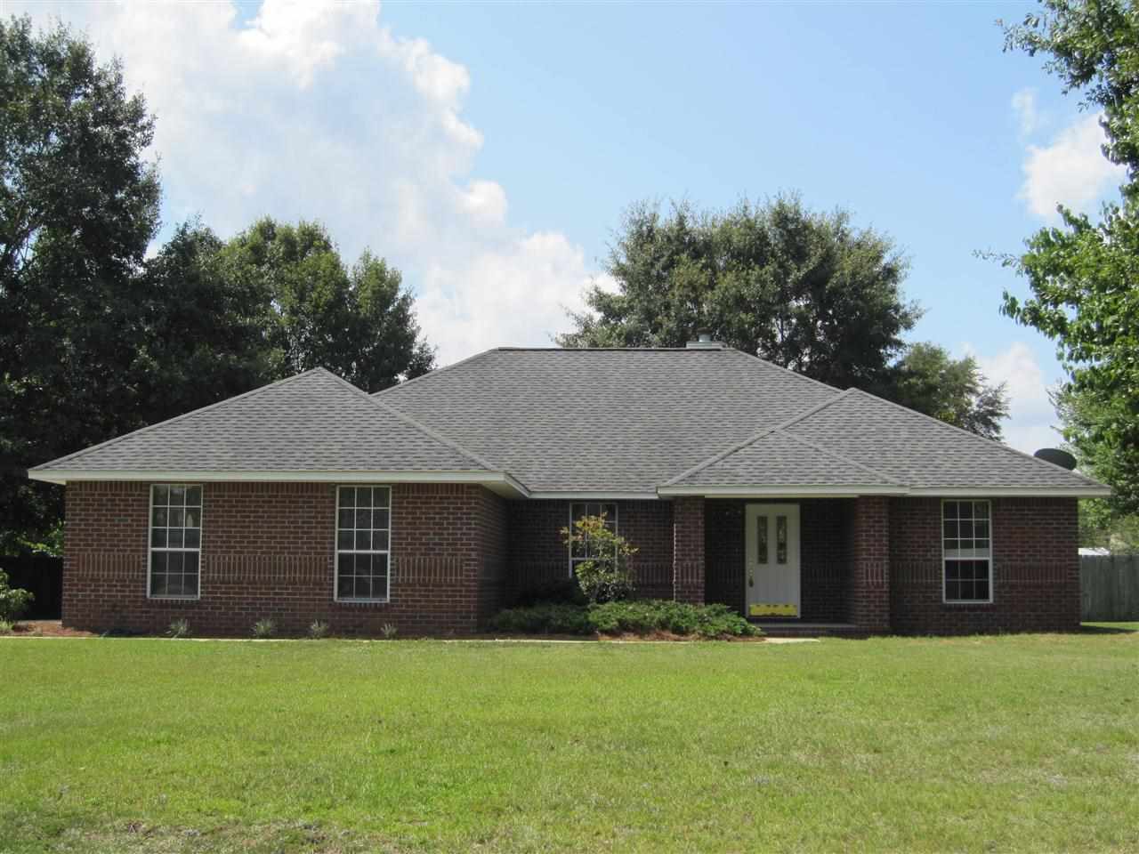 Beautiful curb appeal on almost 3/4 acres!