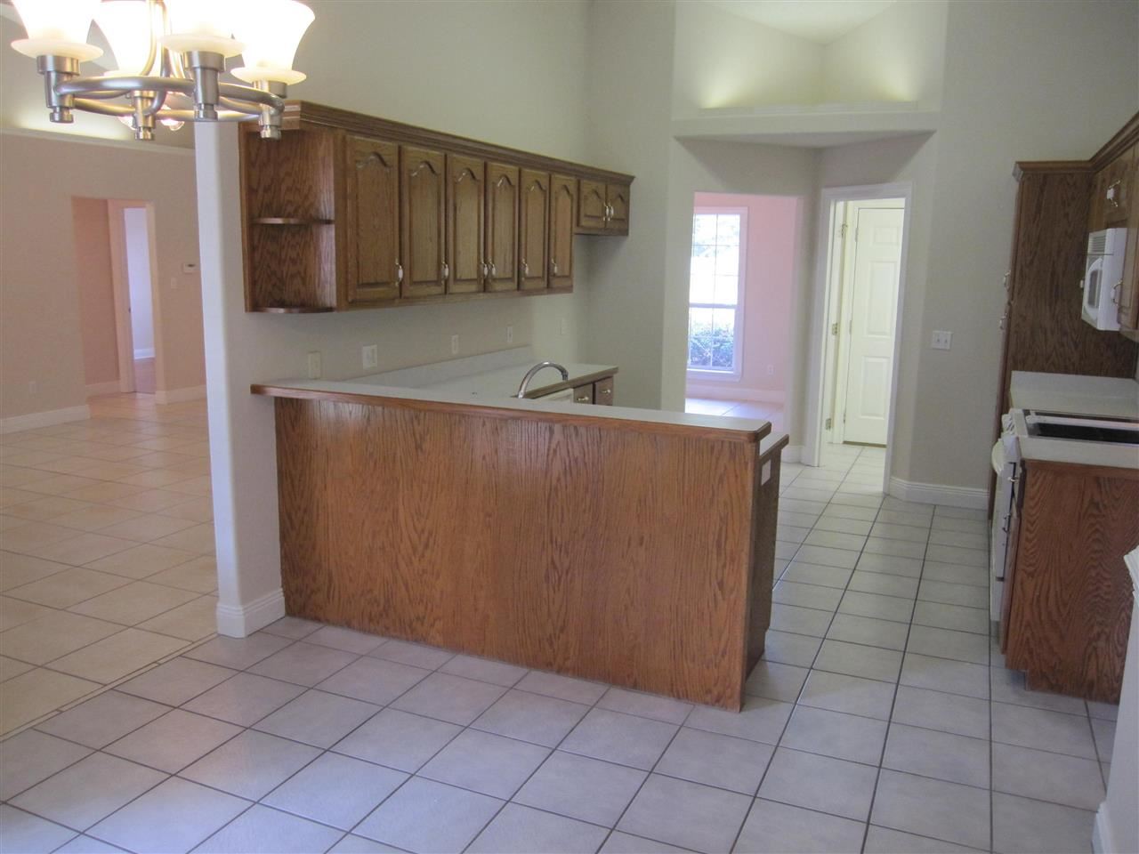 5322 Morgan Ridge Drive Milton, FL 32570 - Photo 13 of 50 Notice the lighted plant shelf above the doorway.