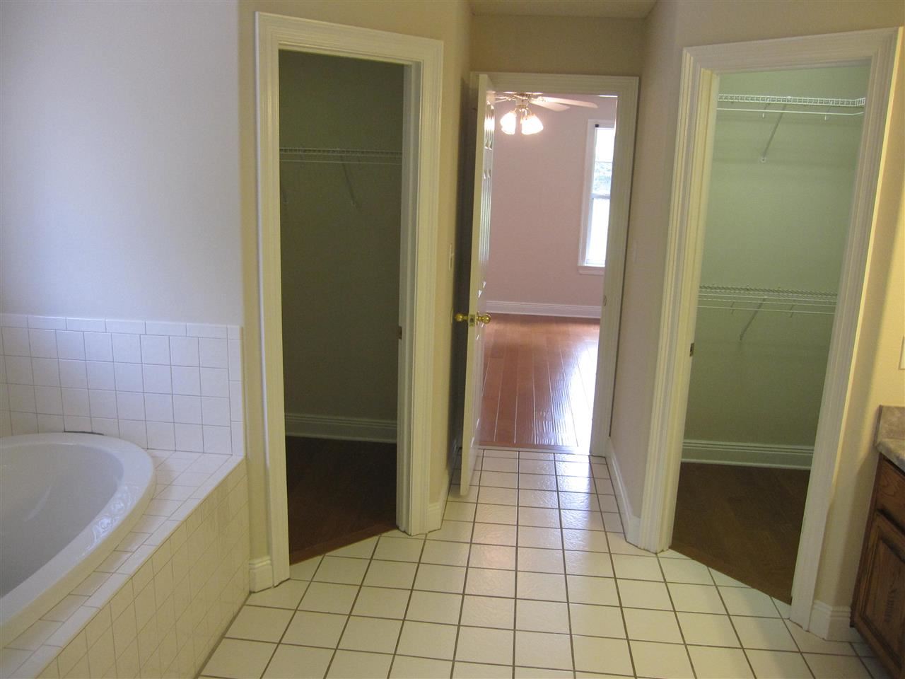 5322 Morgan Ridge Drive Milton, FL 32570 - Photo 21 of 50 His & her walk-in closets to your left & right.