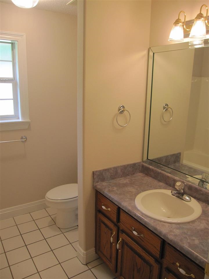5322 Morgan Ridge Drive Milton, FL 32570 - Photo 27 of 50 with tile flooring. Tub/shower to your left.