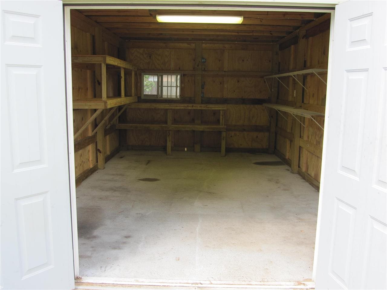 5322 Morgan Ridge Drive Milton, FL 32570 - Photo 36 of 50 doors. Concrete slab floor & a window.