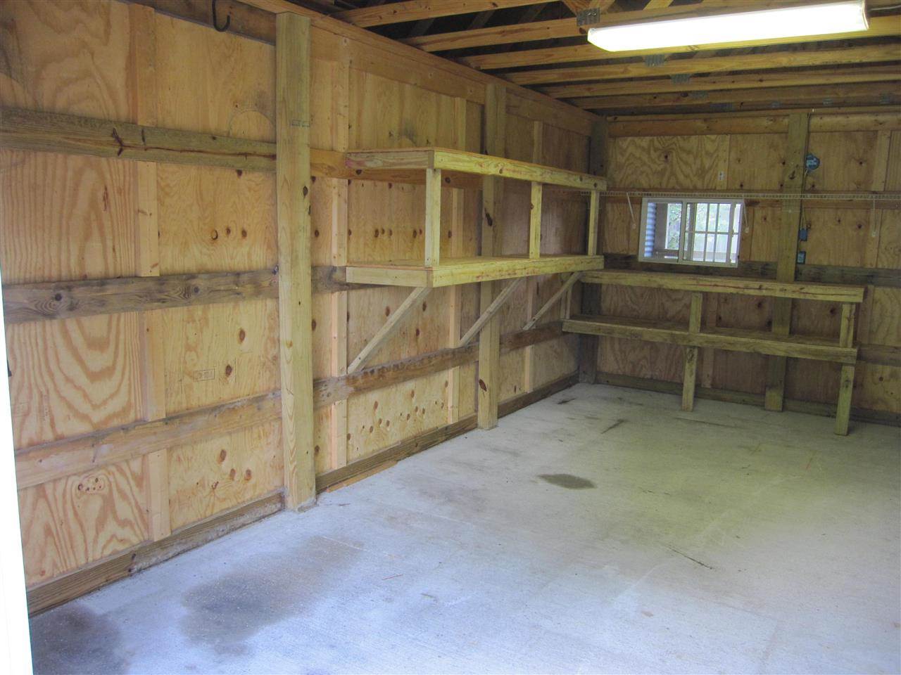 5322 Morgan Ridge Drive Milton, FL 32570 - Photo 37 of 50 shelves. More storage above the rafters.