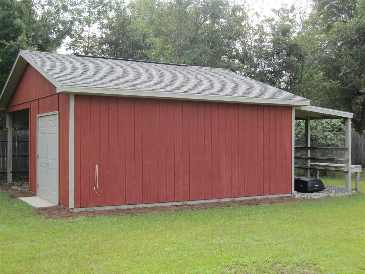5322 Morgan Ridge Drive Milton, FL 32570 - Photo 40 of 50 RV/boat parking & the Lean Too in the rear.