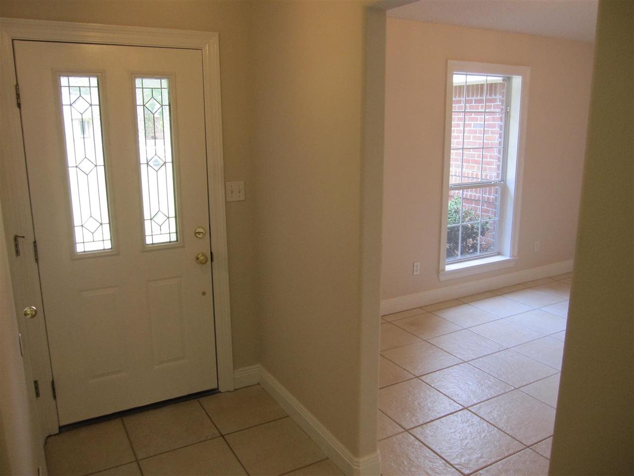 5322 Morgan Ridge Drive Milton, FL 32570 - Photo 8 of 50 of the front door. Formal dining room to your R.
