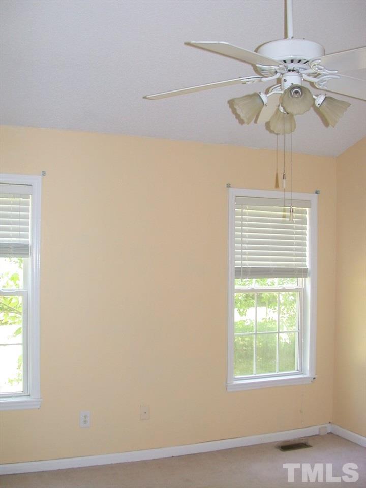 2124 Ruddy Road Raleigh, NC 27616 - Photo 11 of 20 a view of a room with windows and chandelier