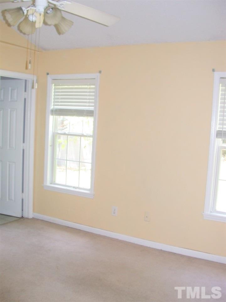 2124 Ruddy Road Raleigh, NC 27616 - Photo 12 of 20 an empty room with a window