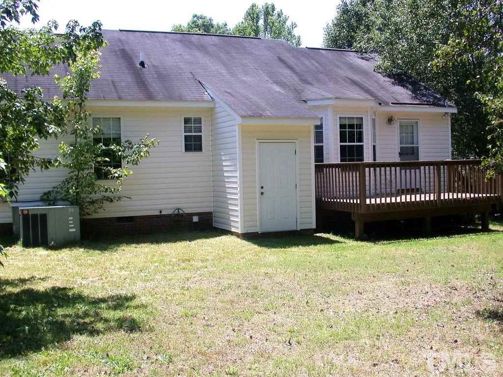 2124 Ruddy Road Raleigh, NC 27616 - Photo 16 of 20 a view of a house with wooden fence