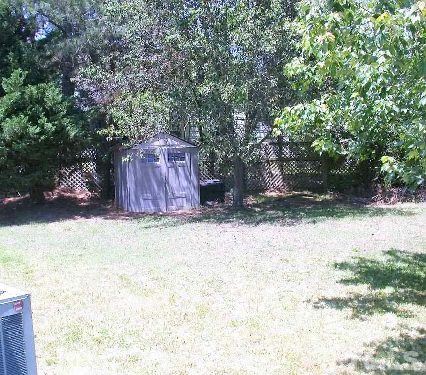 2124 Ruddy Road Raleigh, NC 27616 - Photo 18 of 20 a view of a backyard of the house