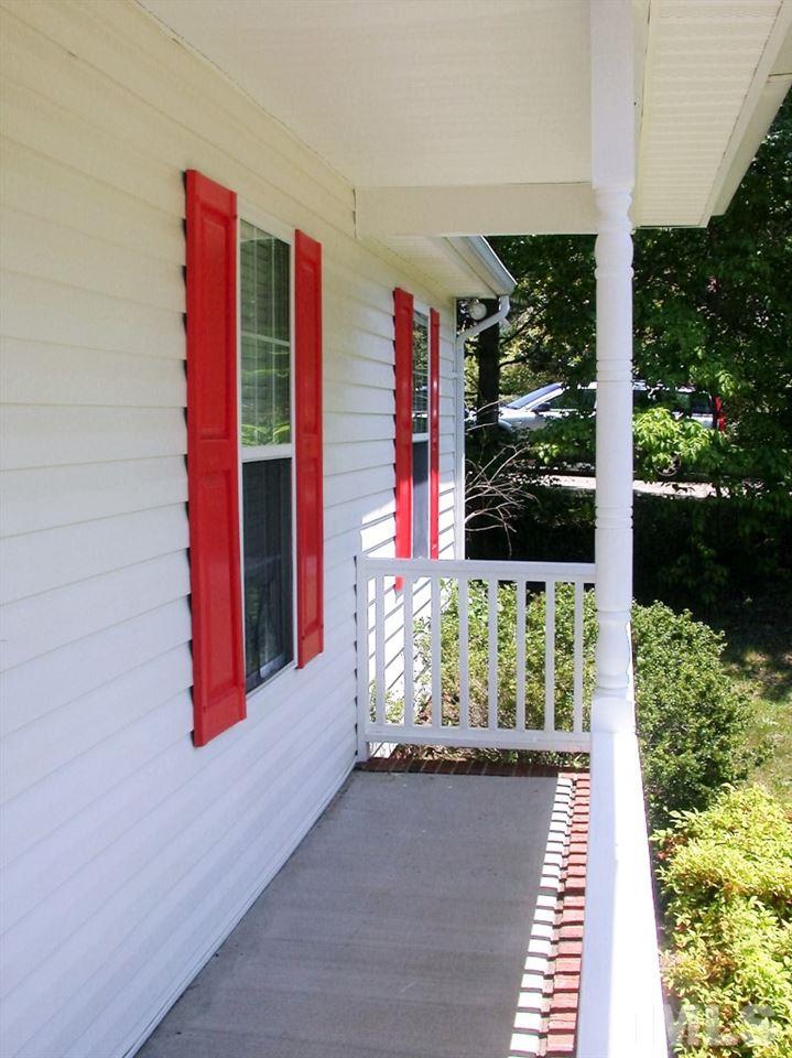 2124 Ruddy Road Raleigh, NC 27616 - Photo 3 of 20 a balcony with lots of green space and plants