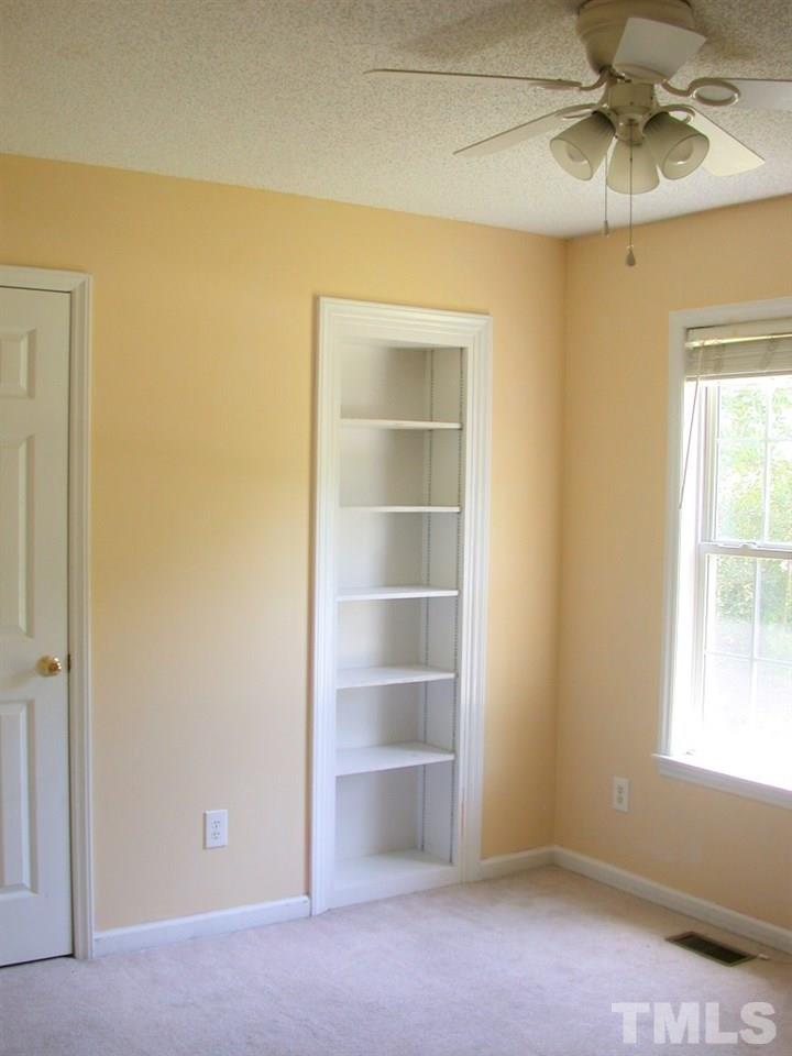 2124 Ruddy Road Raleigh, NC 27616 - Photo 9 of 20 a view of an empty room with a window