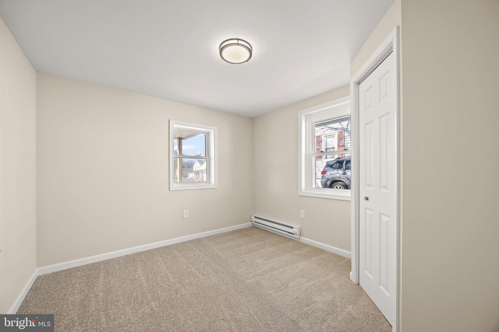2109 Ferncroft Avenue Upper Chichester, PA 19061 - Photo 12 of 25 an empty room with windows