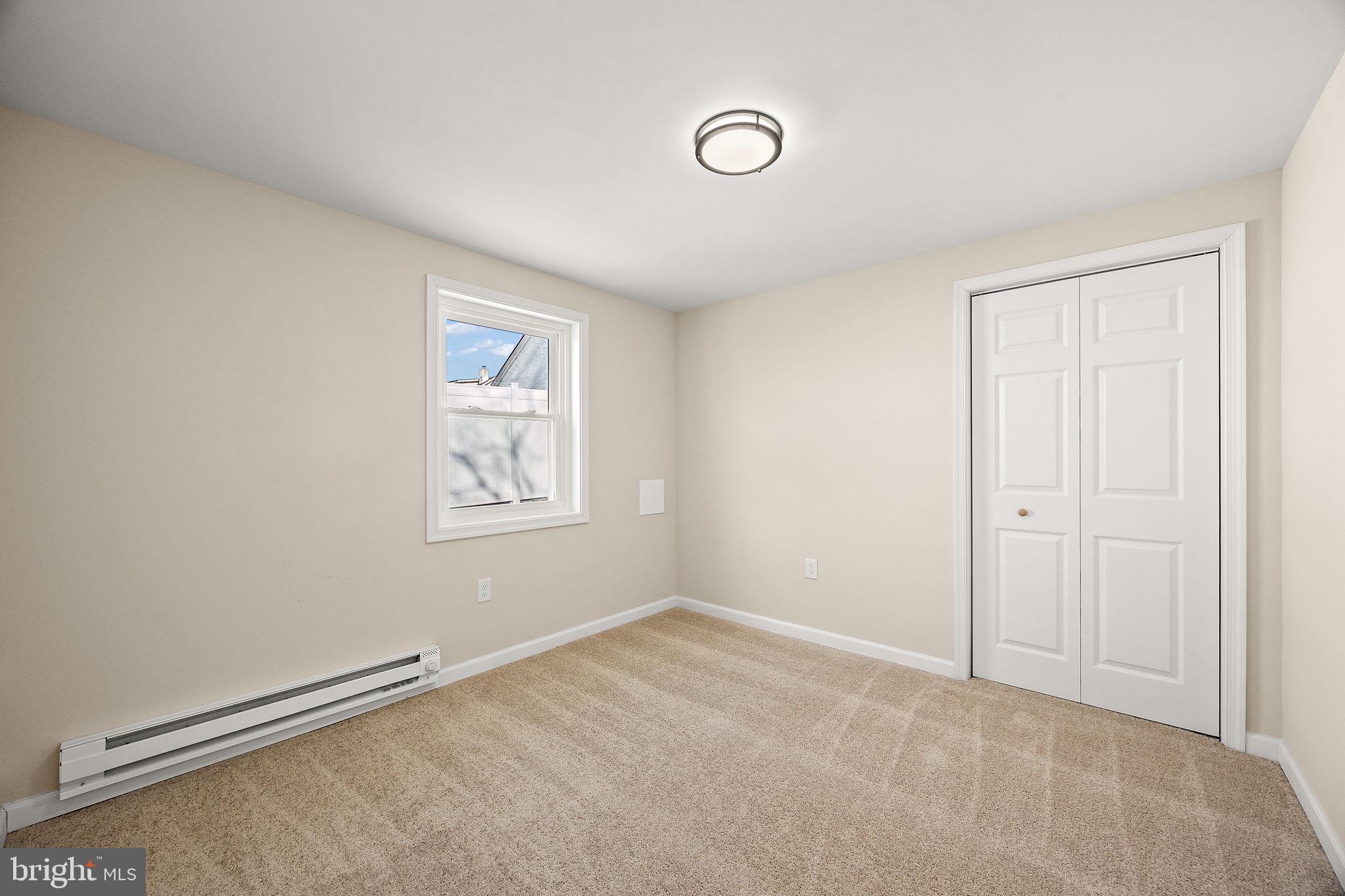 2109 Ferncroft Avenue Upper Chichester, PA 19061 - Photo 14 of 25 a view of an empty room with a window