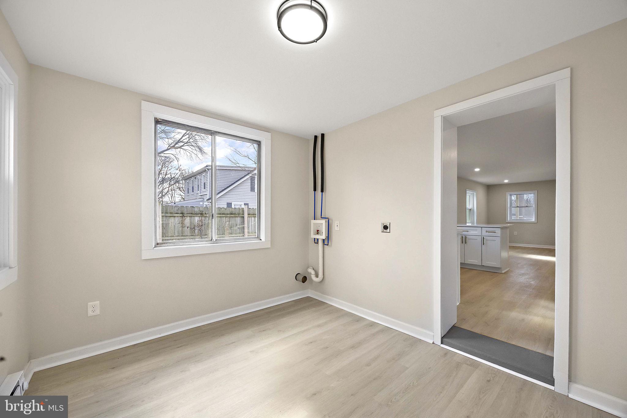2109 Ferncroft Avenue Upper Chichester, PA 19061 - Photo 17 of 25 an empty room with windows and closet
