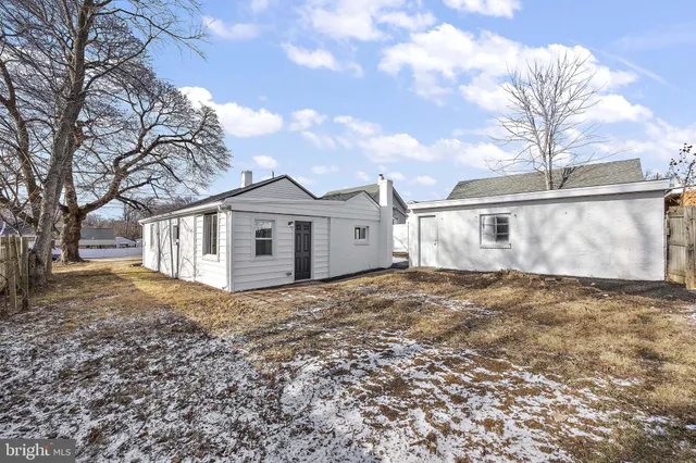 a view of a backyard of the house