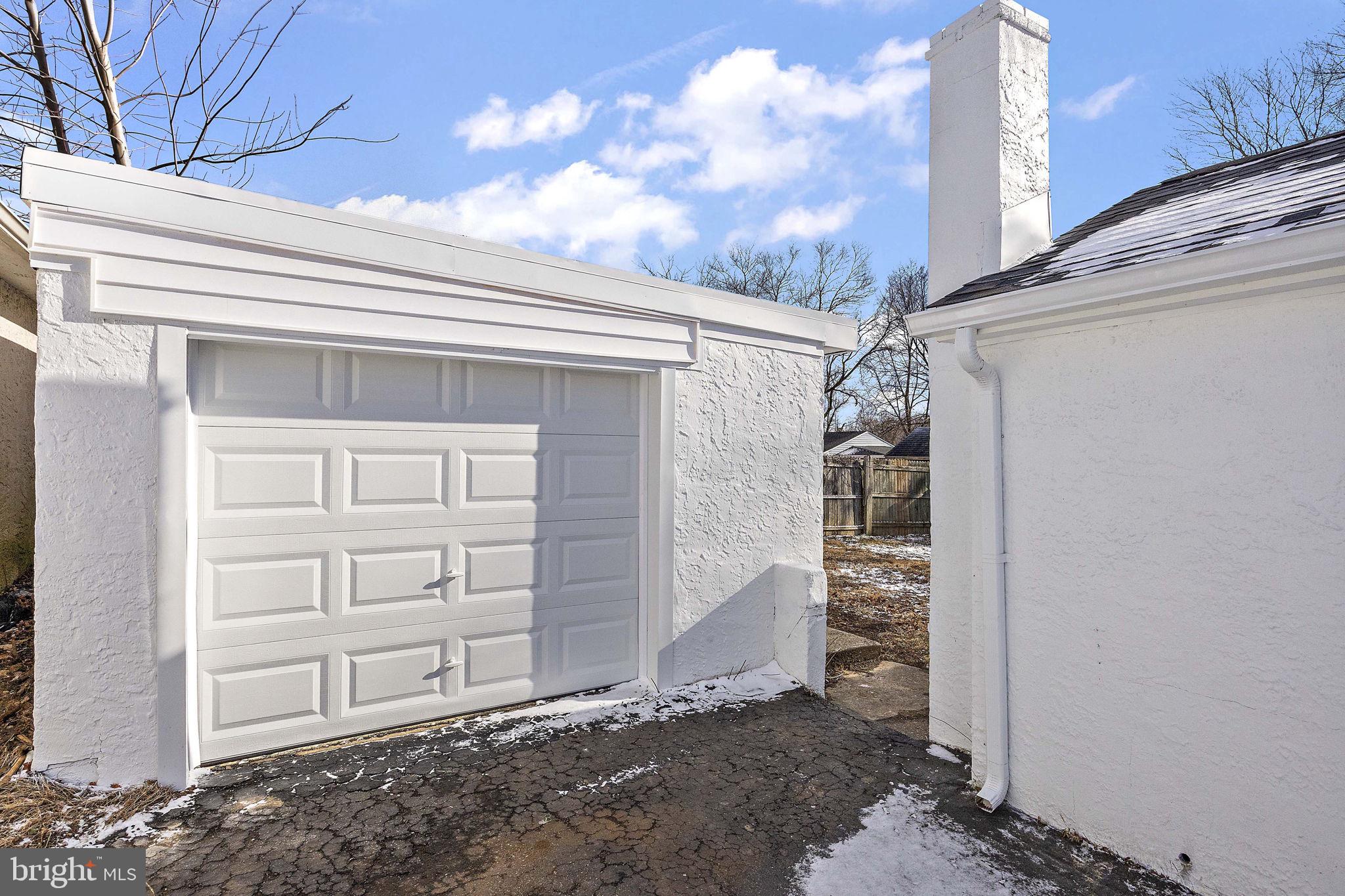 2109 Ferncroft Avenue Upper Chichester, PA 19061 - Photo 23 of 25 a view of a house with a door and wooden walls