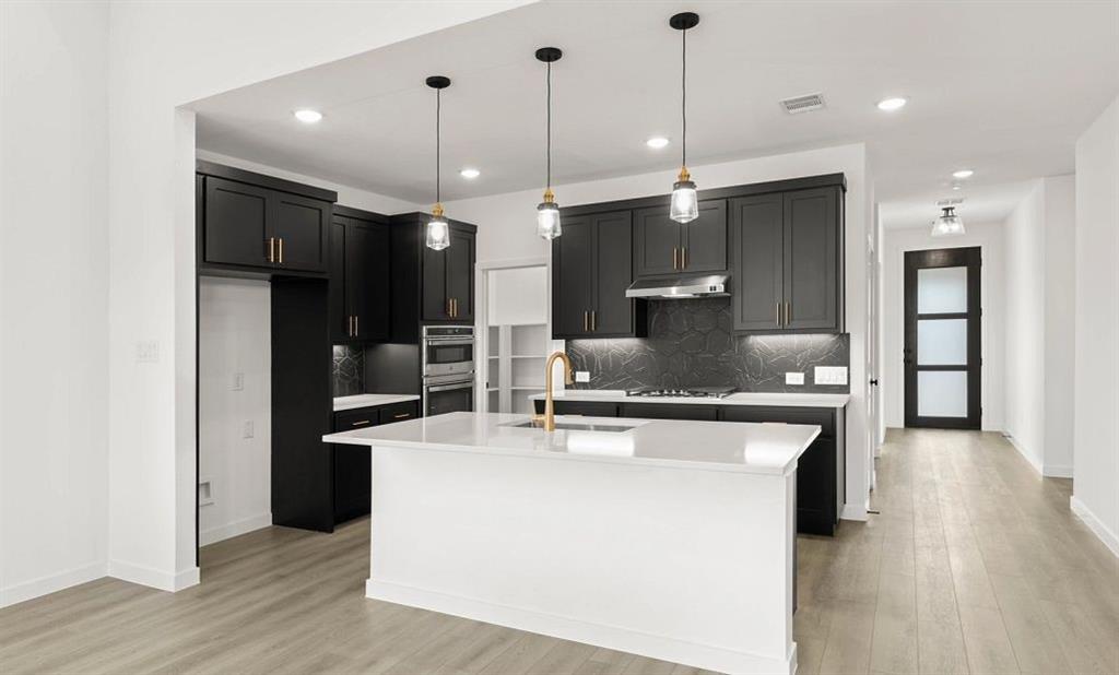 908 Colgate Circle Princeton, TX 75407 - Photo 4 of 14 Kitchen Representative Photo featuring the Noir Collection