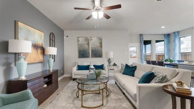 a view of a livingroom with furniture and window