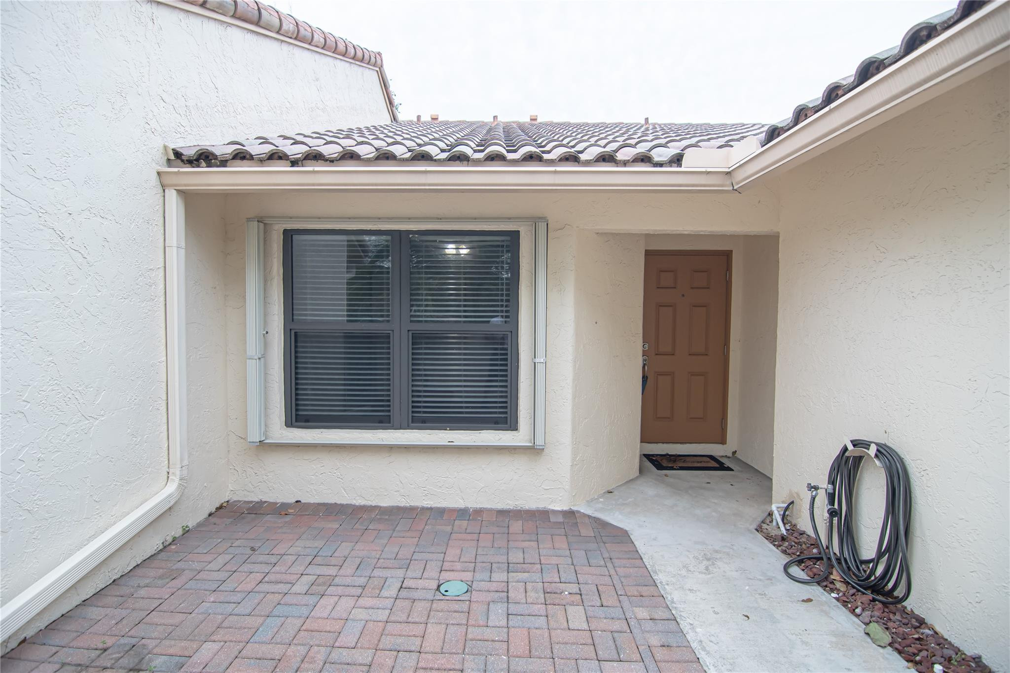 425 Cottonwood Place Boca Raton, FL 33431 - Photo 8 of 29 FENCED COURTYARD ENTRANCE