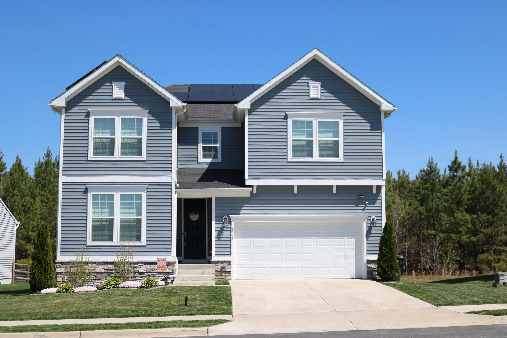 6371 Pointer Lane King George, VA 22485 - Photo 1 of 38 a front view of a house with garden