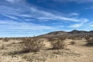 a view of lake with mountain