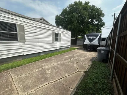 a view of a back yard of the house