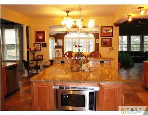 150 Emley's Hill Road Cream Ridge, NJ 08514 - Photo 2 of 11 a view of a living room and kitchen