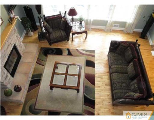 150 Emley's Hill Road Cream Ridge, NJ 08514 - Photo 7 of 11 a view of living room with furniture and wooden floor