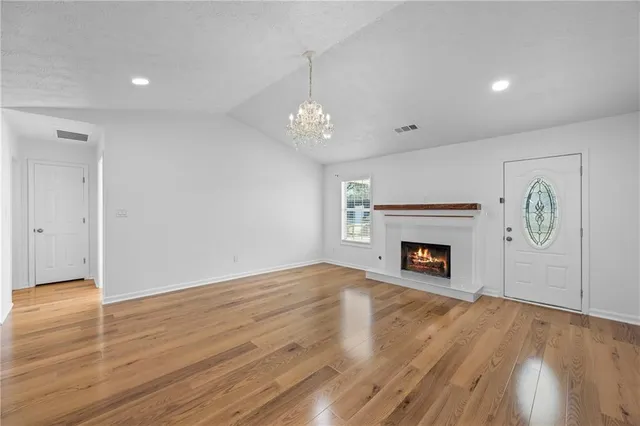 a bathroom with double sink and a mirror