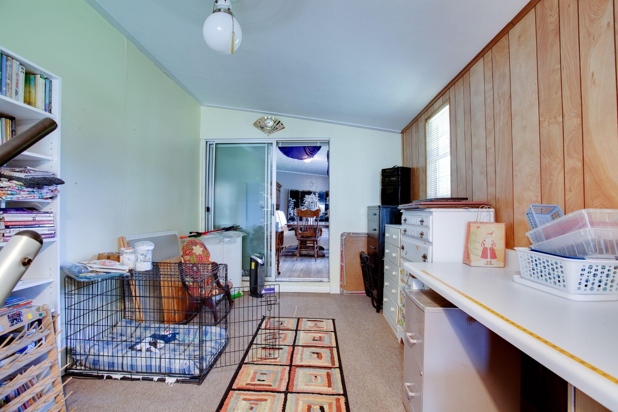 106 Phillips Lane Oak Ridge, TN 37830 - Photo 20 of 26 a storage room with furniture and a flat screen tv
