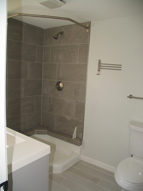 11 Black Point Road Webster, MA 01570 - Photo 19 of 28 a bathroom with a shower and toilet